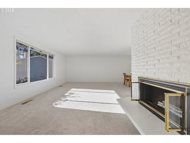 a living room with a fireplace