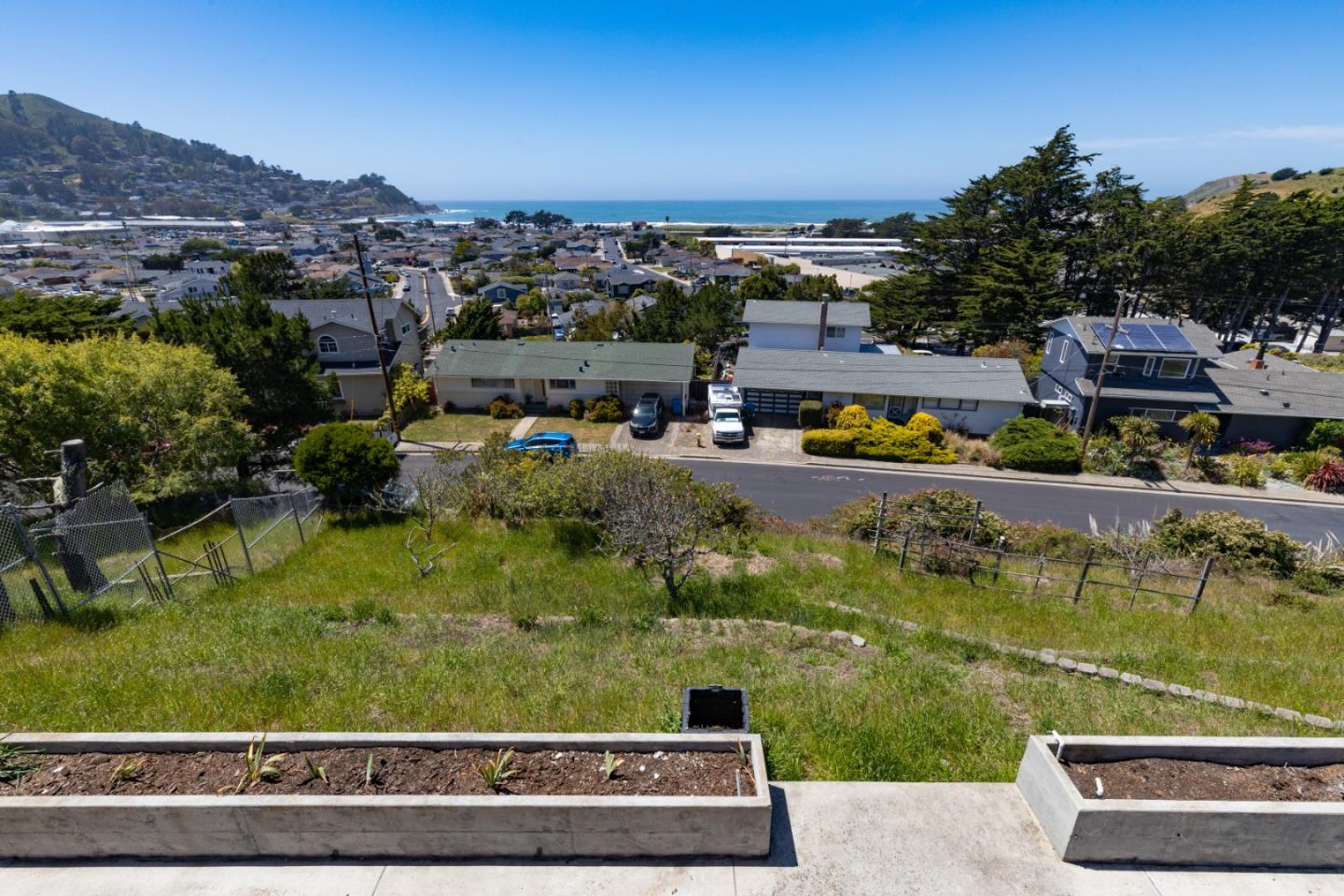 720 Alta Vista Drive Pacifica, CA 94044 - Photo 24 of 40 an aerial view of residential houses with outdoor space