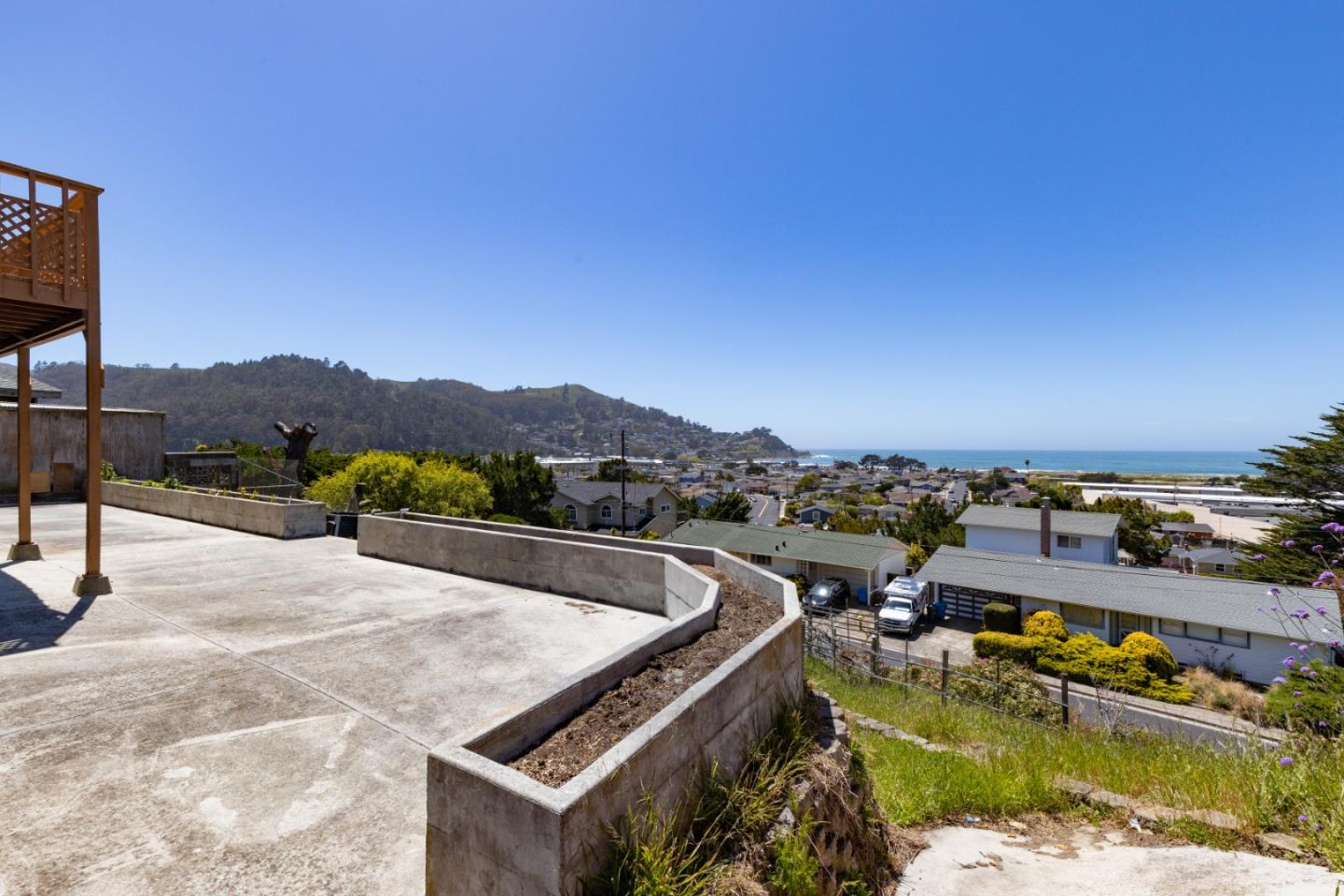720 Alta Vista Drive Pacifica, CA 94044 - Photo 25 of 40 a view of a swimming pool with a lake view
