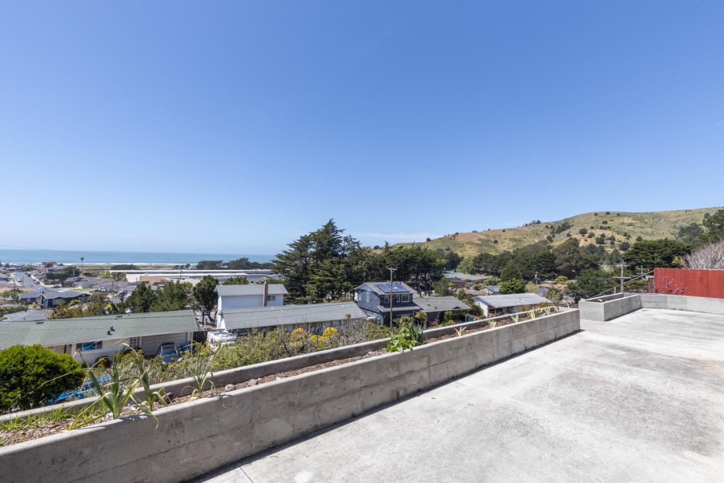 720 Alta Vista Drive Pacifica, CA 94044 - Photo 27 of 40 a view of a street with a road