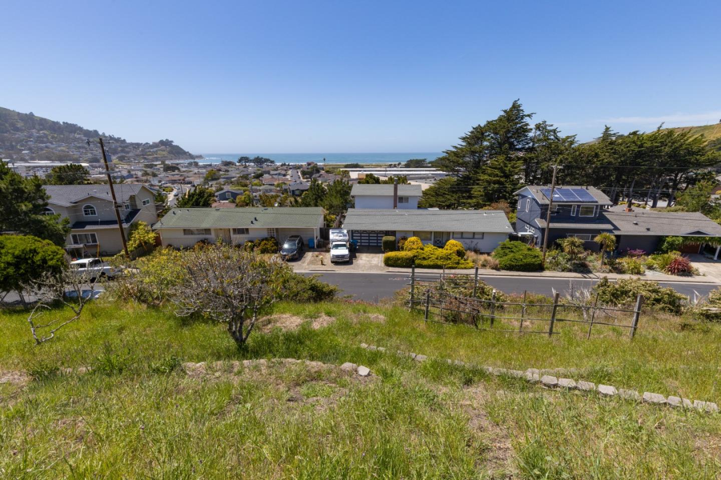 720 Alta Vista Drive Pacifica, CA 94044 - Photo 28 of 40 a view of a lake with houses