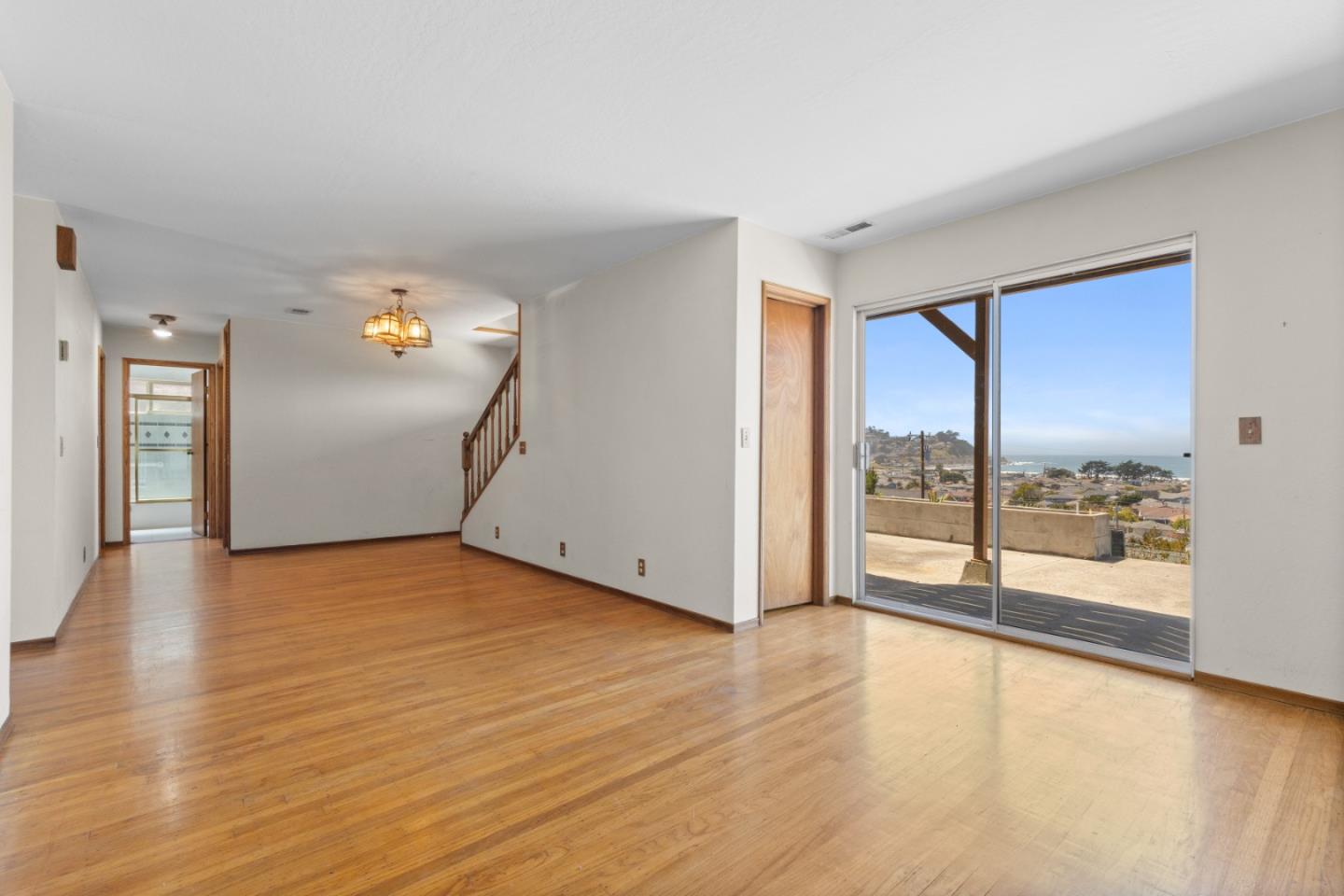 720 Alta Vista Drive Pacifica, CA 94044 - Photo 10 of 40 wooden floor in an empty room with a window
