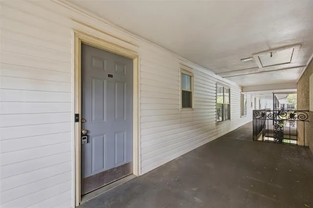 a view of dining room with furniture and a window