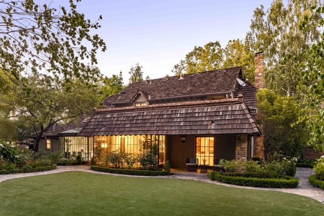 a view of a building with a garden