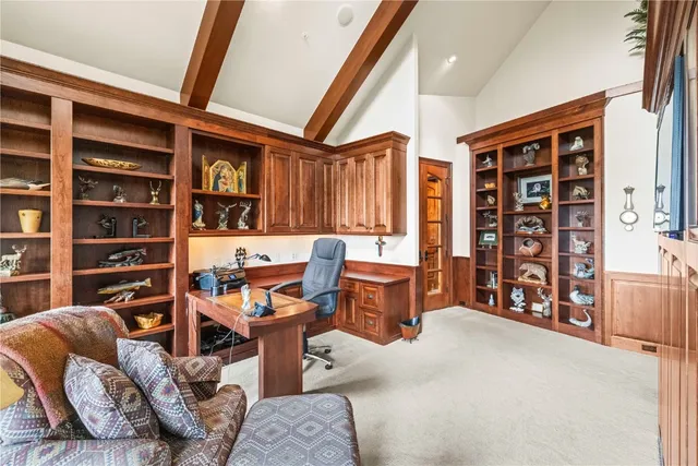 a reading room with furniture and closet