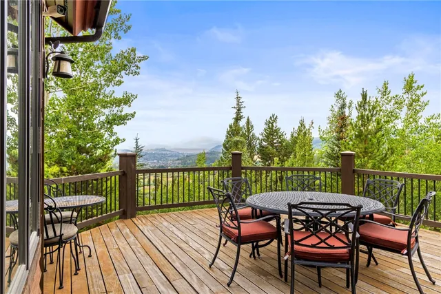 a view of a chairs on the roof deck