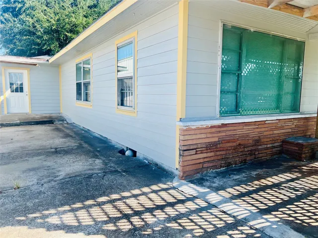 a view of a backyard of a house