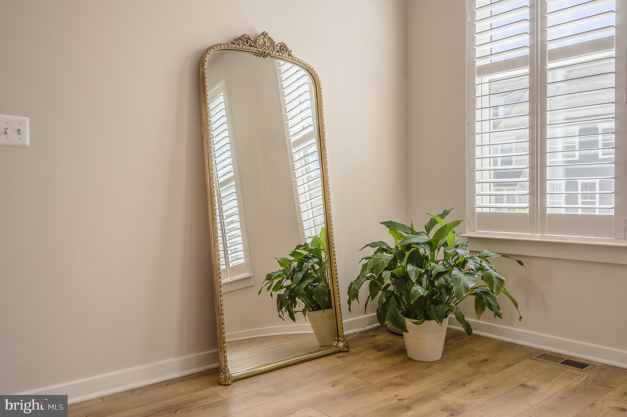 1606 Grove Chestnut Road Dumfries, VA 22026 - Photo 32 of 63 Area in front of stairs going to upper level