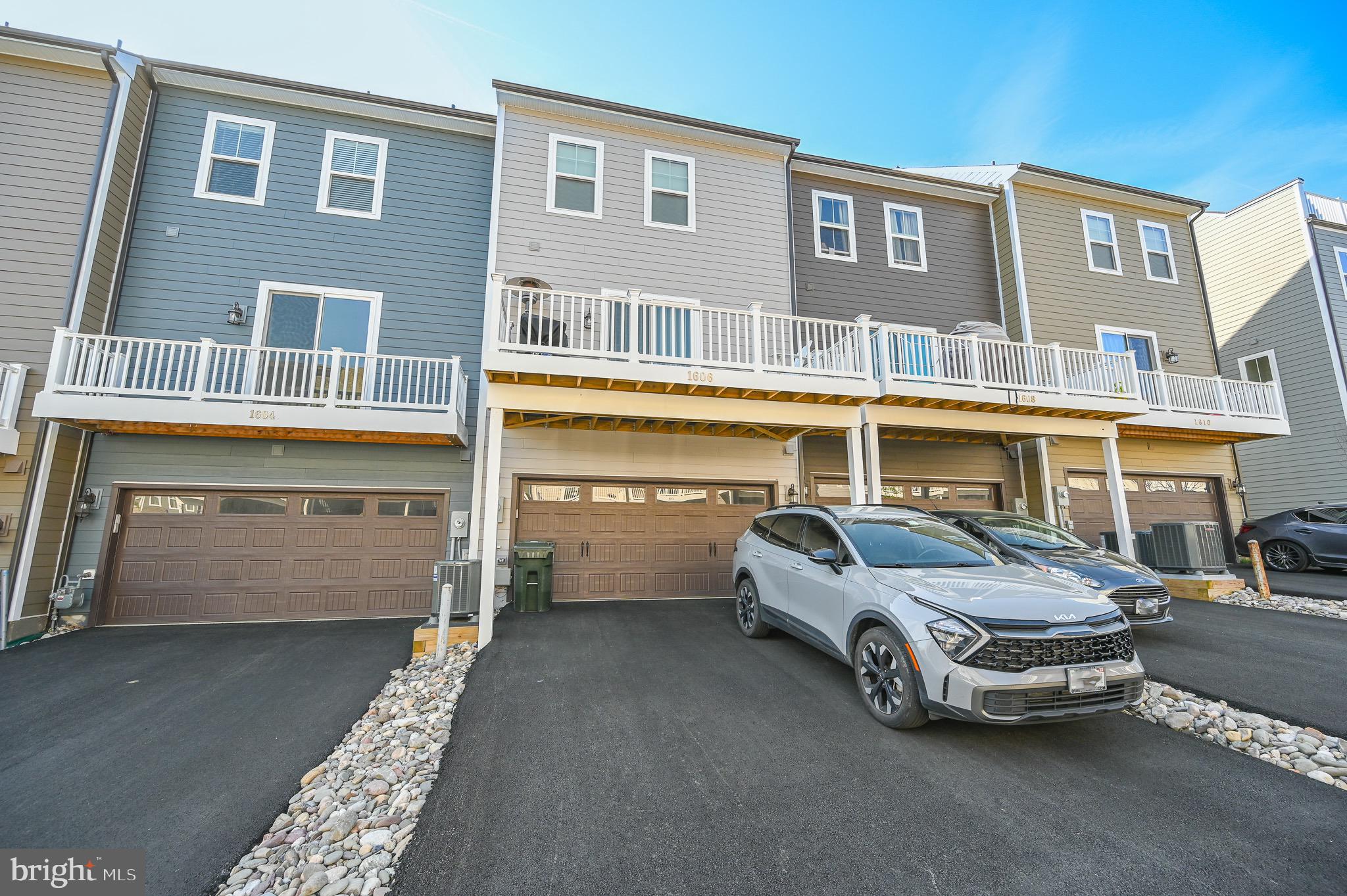 1606 Grove Chestnut Road Dumfries, VA 22026 - Photo 5 of 63 2 Car Garage with ample driveway
