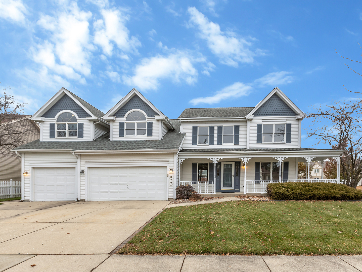 872 New Britton Road Carol Stream, IL 60188 - Photo 1 of 22 a view of residential houses with yard and green space