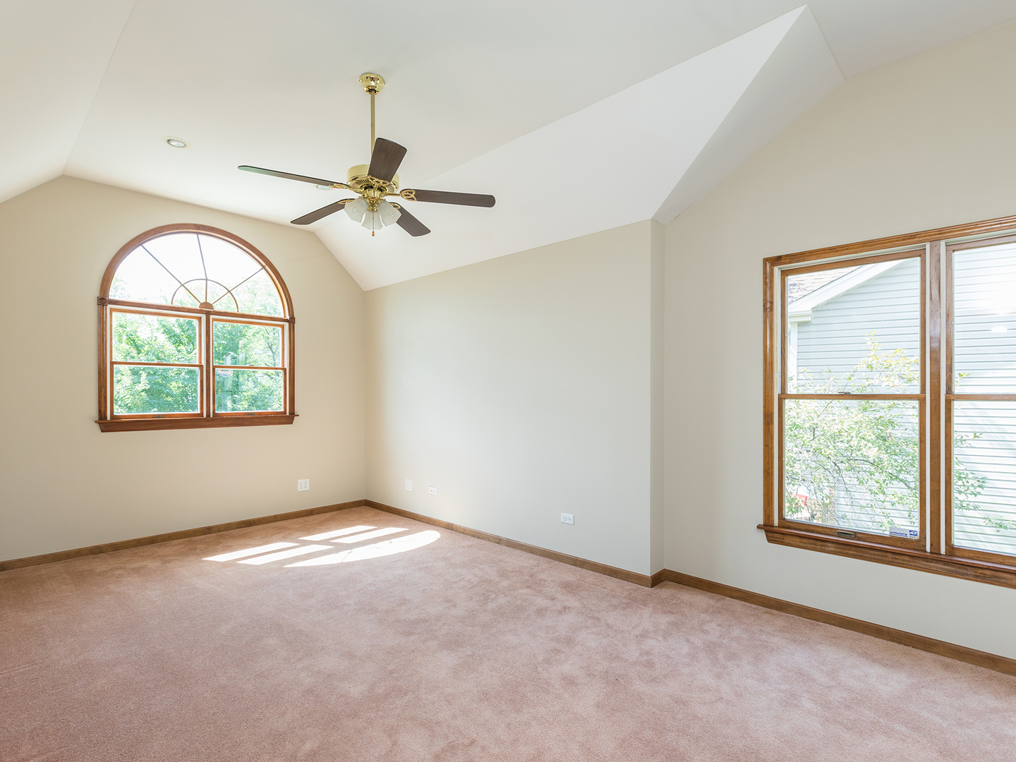872 New Britton Road Carol Stream, IL 60188 - Photo 14 of 22 an empty room with windows and fan