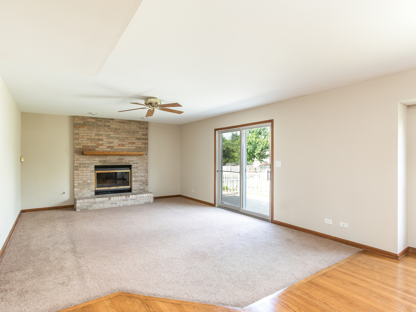 872 New Britton Road Carol Stream, IL 60188 - Photo 9 of 22 a view of empty room with a fireplace