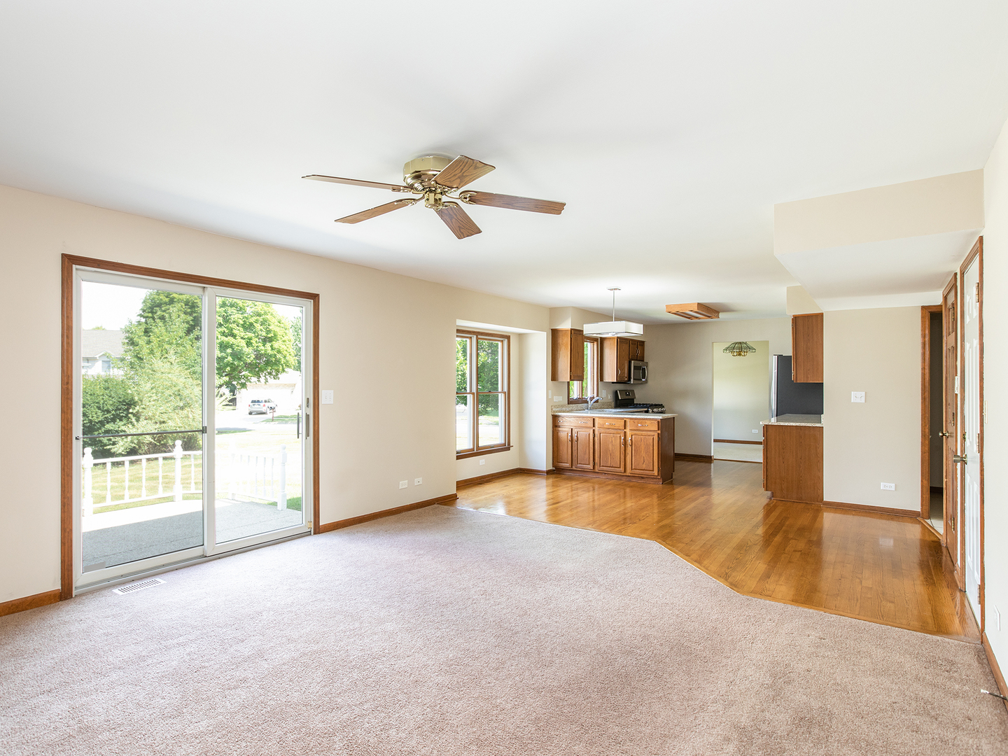 872 New Britton Road Carol Stream, IL 60188 - Photo 10 of 22 a living room with furniture and a large window
