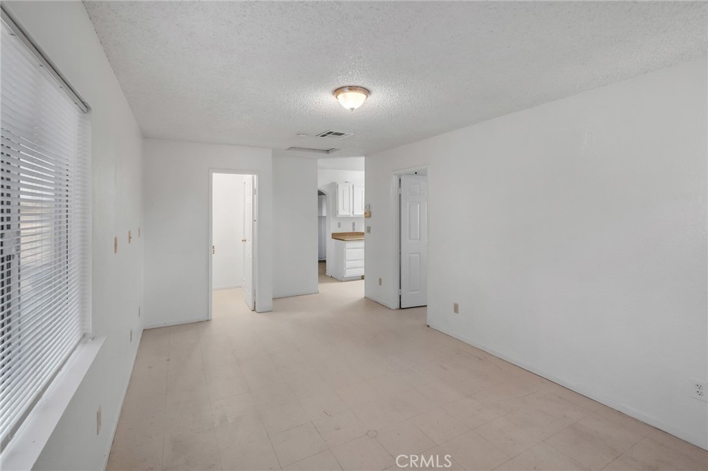 13189-13193 Begonia Road, Unit 2 Victorville, CA 92392 - Photo 15 of 25 13193 Begonia Rd, Living Rm, view of kitch.