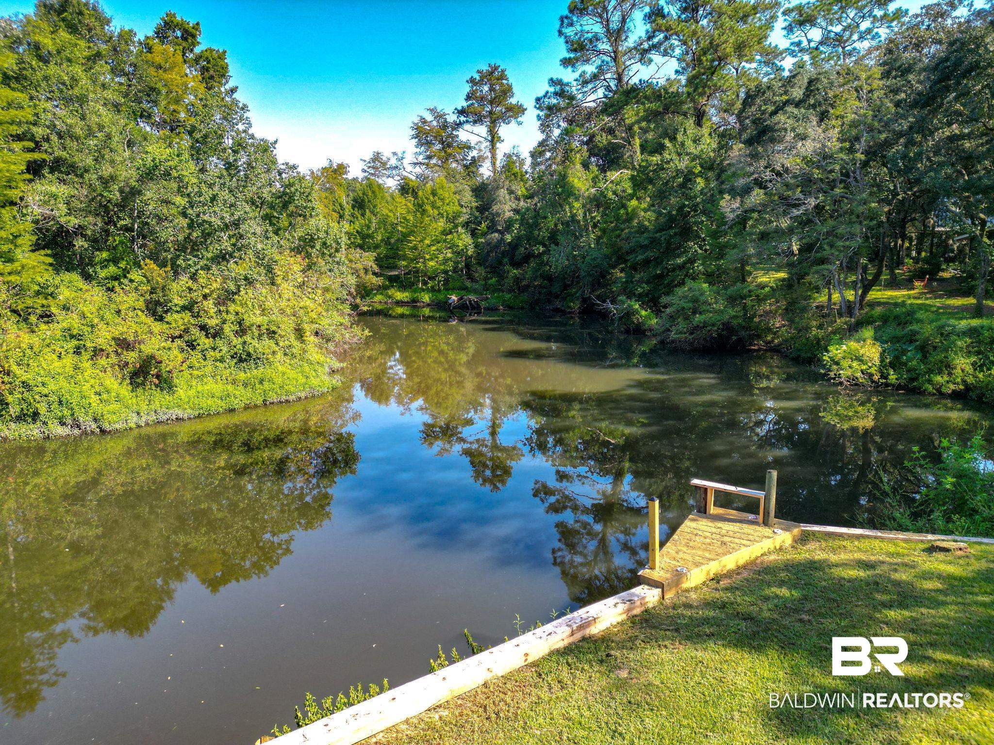 12855 Woodhaven Dairy Road West Silverhill, AL 36576 - Photo 9 of 27 Dock with a water view