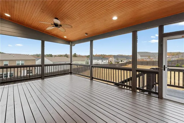 a view of balcony with furniture