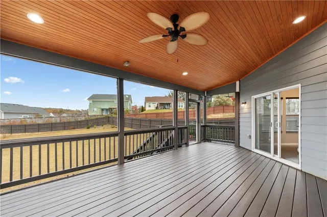 a view of a porch with wooden floor