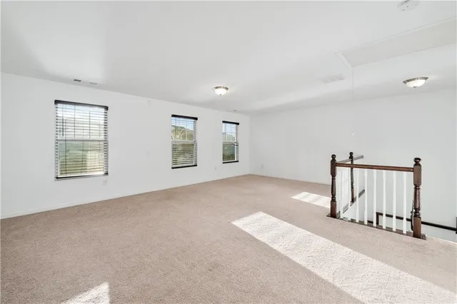 a view of a livingroom with stair