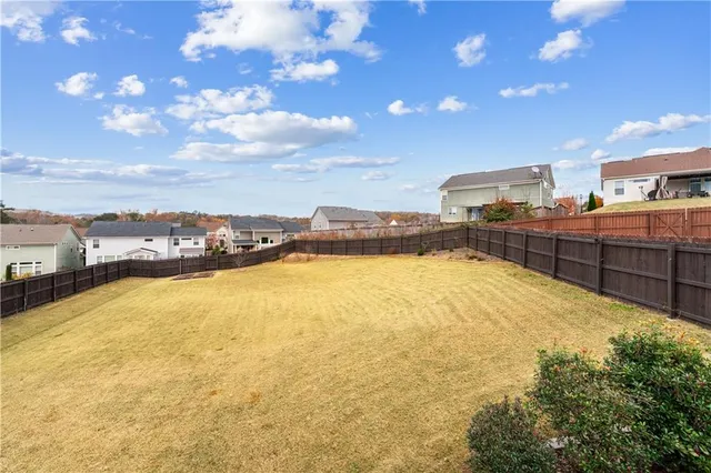 a view of a swimming pool and an outdoor space