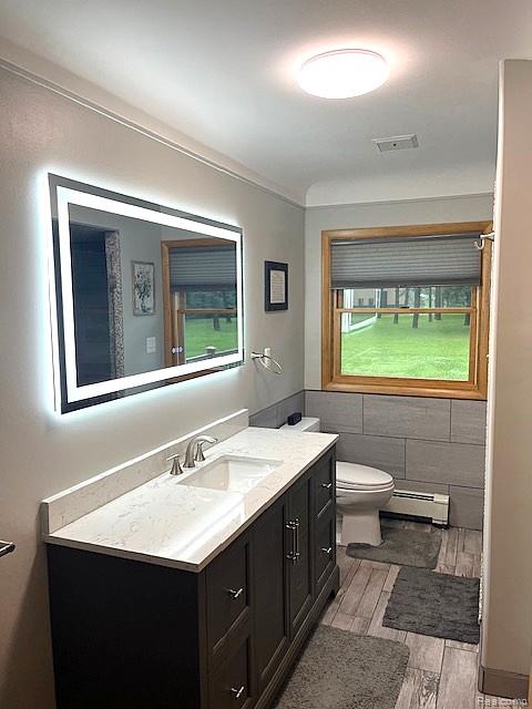 20285 29 Mile Road Ray, MI 48096 - Photo 13 of 25 Modern vanity featuring a white countertop with integrated sink and brushed nickel faucet