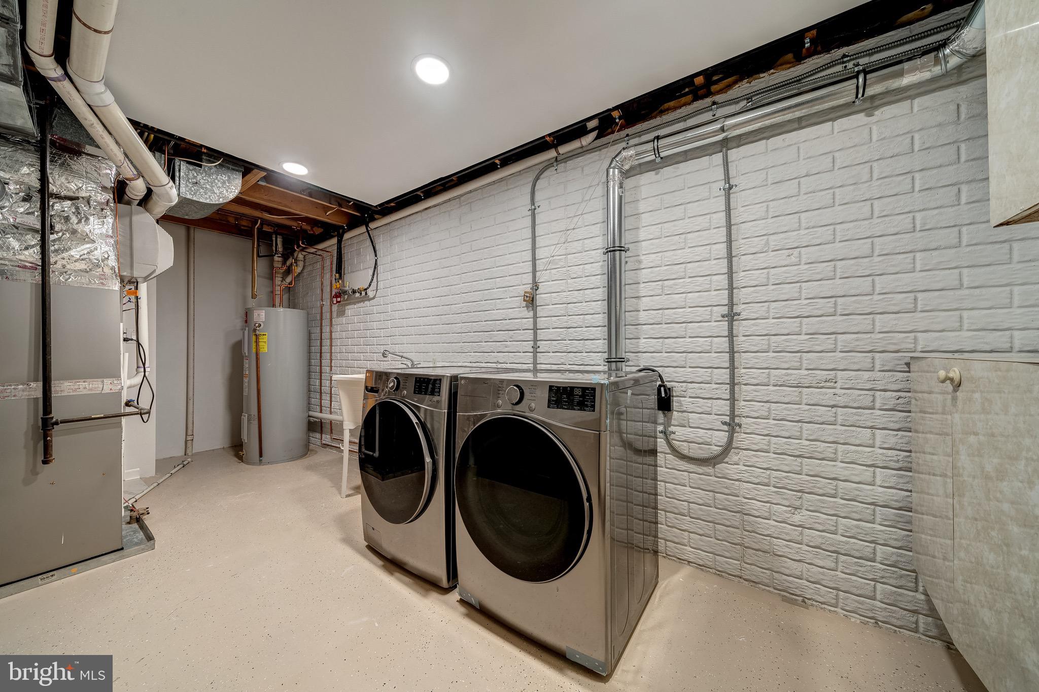 6042 Munson Hill Road Falls Church, VA 22044 - Photo 30 of 30 a utility room with dryer and washer