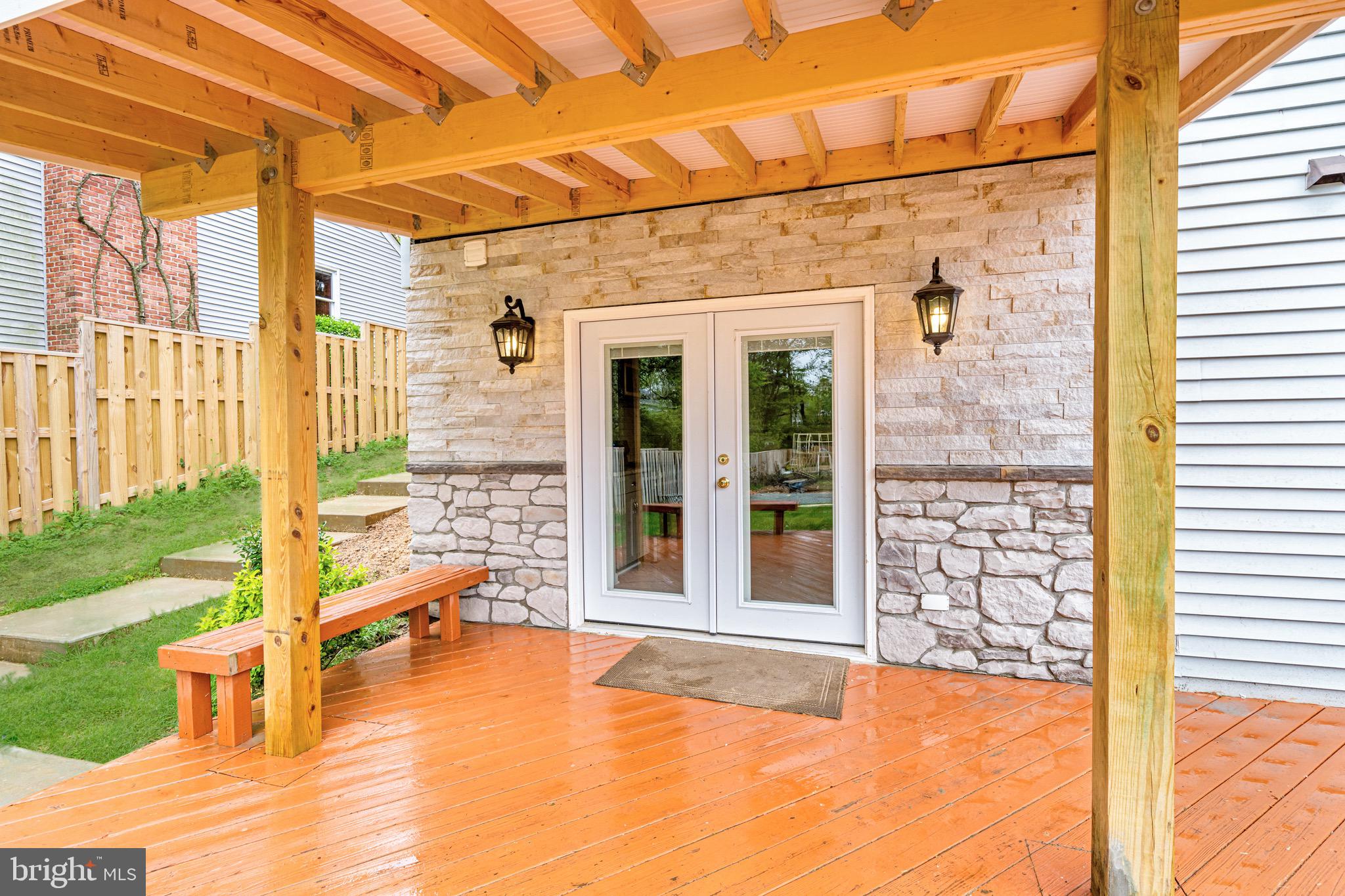 6042 Munson Hill Road Falls Church, VA 22044 - Photo 6 of 30 a view of a balcony with wooden floor and outdoor space