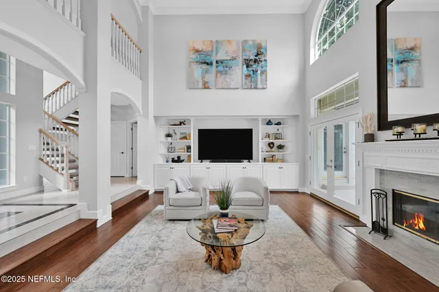 a bathroom with a sink mirror toilet and shower