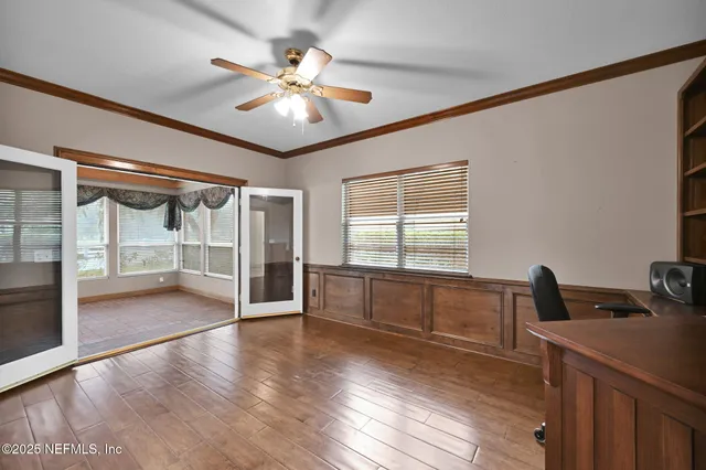 a view of a swimming pool and a yard