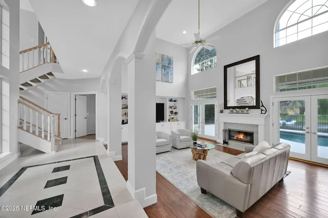 a kitchen with stainless steel appliances granite countertop a refrigerator and a stove
