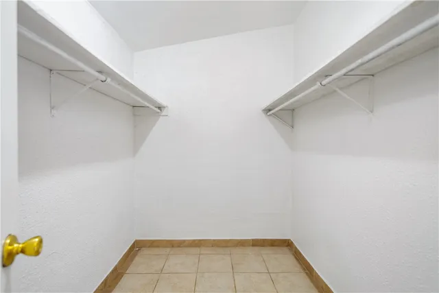 a view of a room with white closet