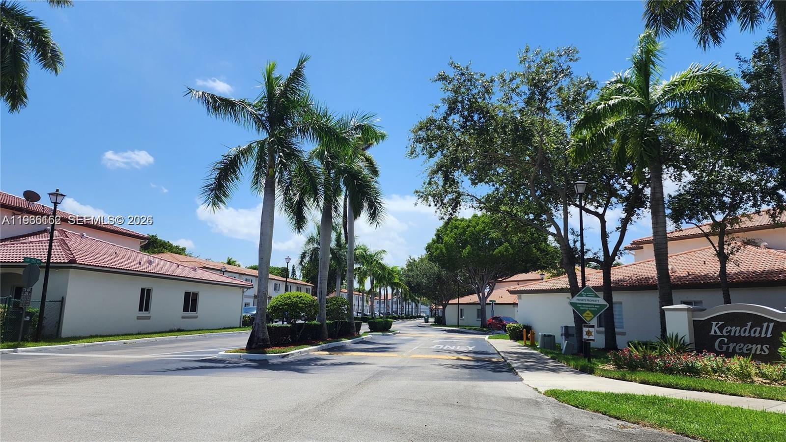 8450 Southwest 150th Avenue, Unit 3 Miami, FL 33193 - Photo 1 of 28 a car parked in front of a house