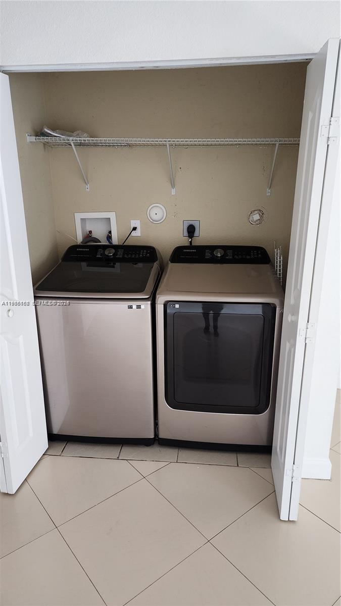 8450 Southwest 150th Avenue, Unit 3 Miami, FL 33193 - Photo 13 of 28 a utility room with washer and dryer