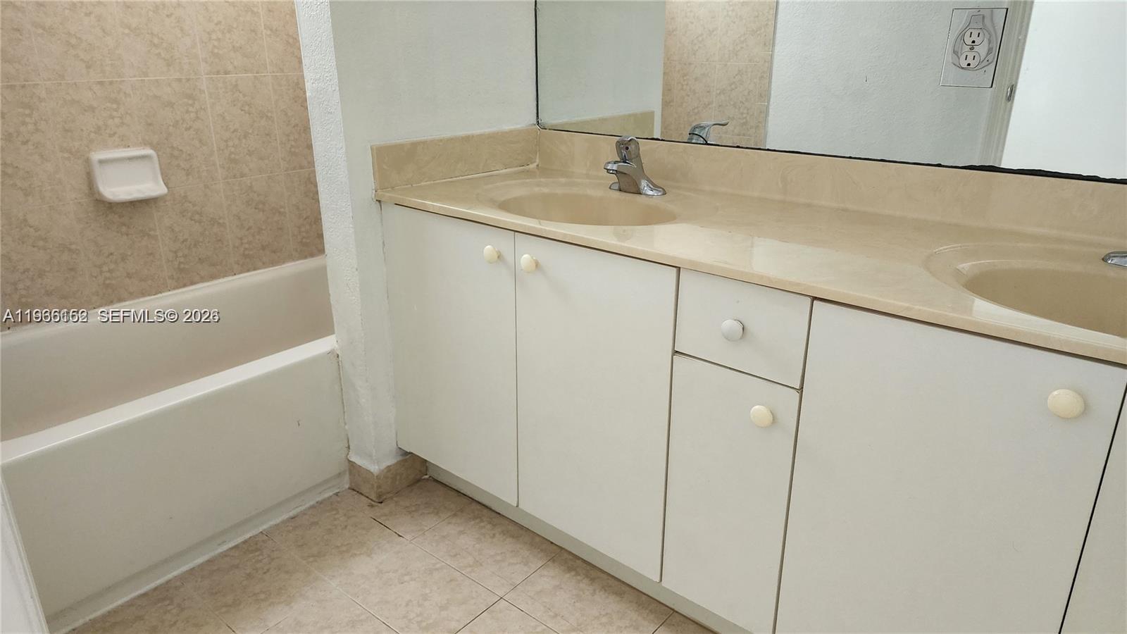 8450 Southwest 150th Avenue, Unit 3 Miami, FL 33193 - Photo 19 of 28 a bathroom with a sink and a bathtub