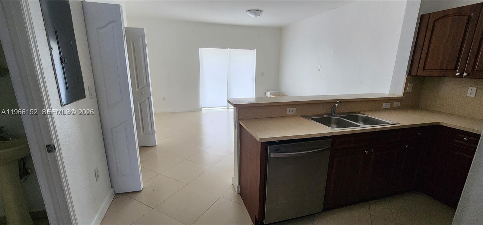 8450 Southwest 150th Avenue, Unit 3 Miami, FL 33193 - Photo 21 of 28 a bathroom with a sink and a mirror