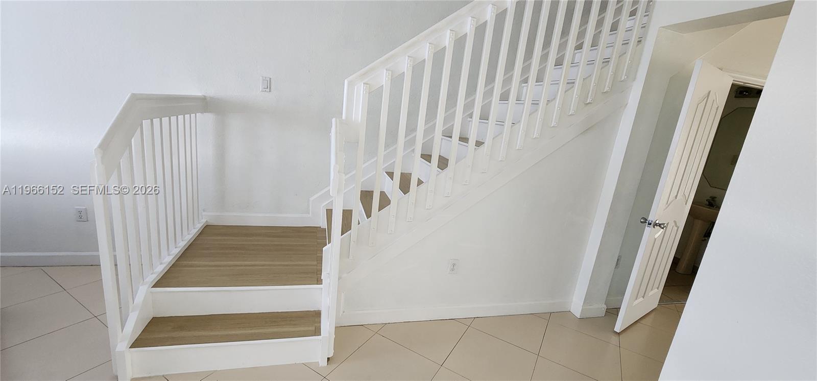 8450 Southwest 150th Avenue, Unit 3 Miami, FL 33193 - Photo 27 of 28 a view of entryway with stairs