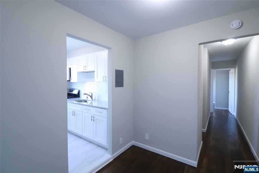 2335 Hudson Terrace, Unit E6 Fort Lee, NJ 07024 - Photo 8 of 29 a view of a kitchen from the hallway