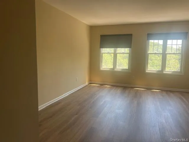 a bathroom with a sink toilet and mirror