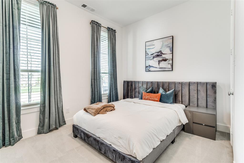 503 North Eagle Pt Road Van Alstyne, TX 75495 - Photo 10 of 25 Carpeted bedroom with baseboards