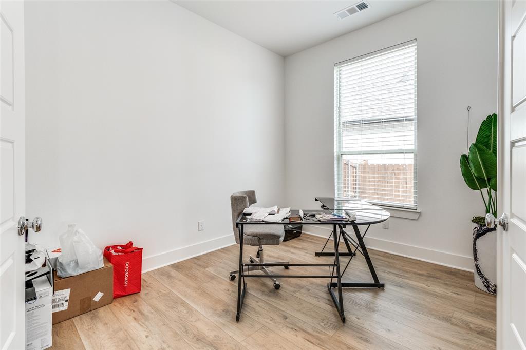 503 North Eagle Pt Road Van Alstyne, TX 75495 - Photo 12 of 25 Home office with light wood-style floors and baseboards