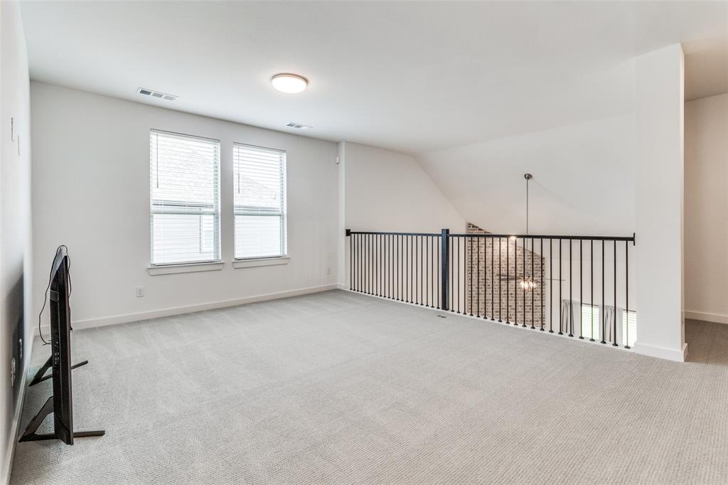 503 North Eagle Pt Road Van Alstyne, TX 75495 - Photo 6 of 25 Bonus room with light carpet
