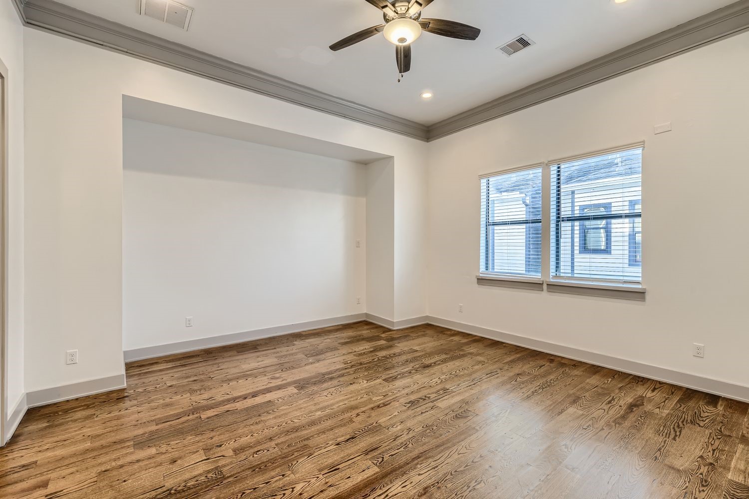 2208 Arabelle Street Houston, TX 77007 - Photo 13 of 26 a view of an empty room with a window