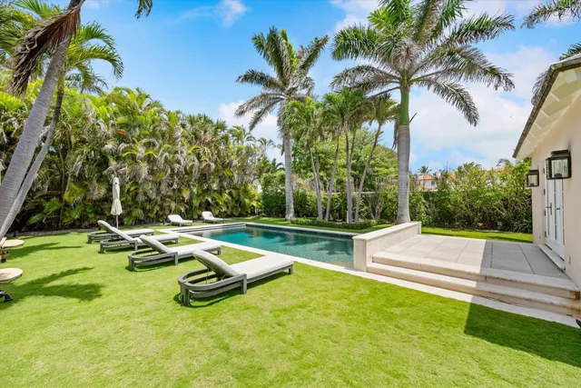 a view of a house with swimming pool