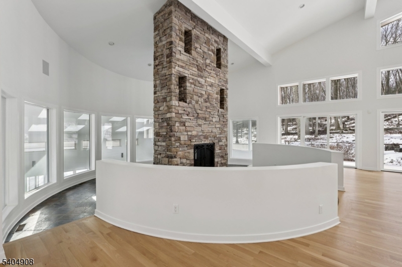 20 Mt Pleasant Road Morristown, NJ 07960 - Photo 11 of 48 a living room with furniture a large window and wooden floor