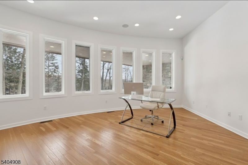 20 Mt Pleasant Road Morristown, NJ 07960 - Photo 13 of 48 a workspace with wooden floor and a table chair