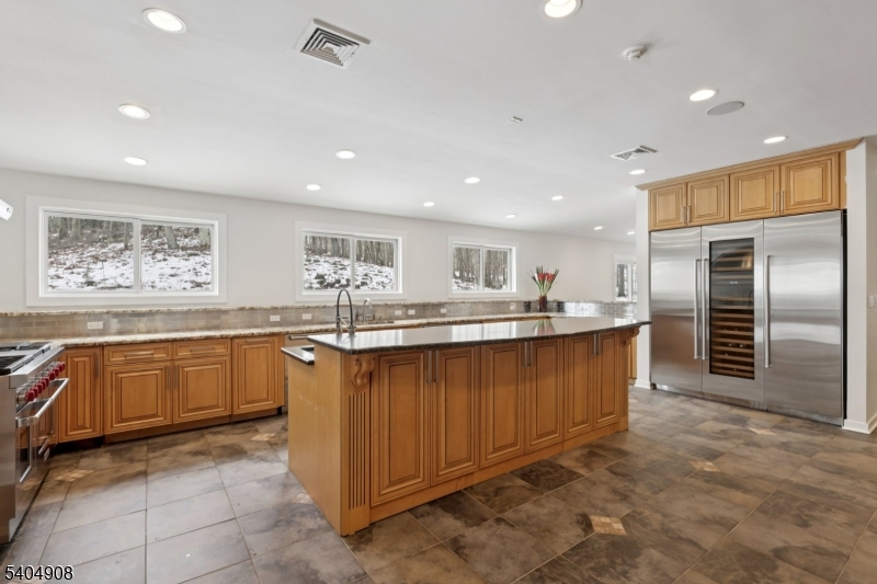 20 Mt Pleasant Road Morristown, NJ 07960 - Photo 26 of 48 a large kitchen with kitchen island a sink a counter top space and stainless steel appliances