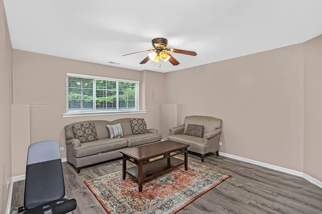 a living room with furniture and rug