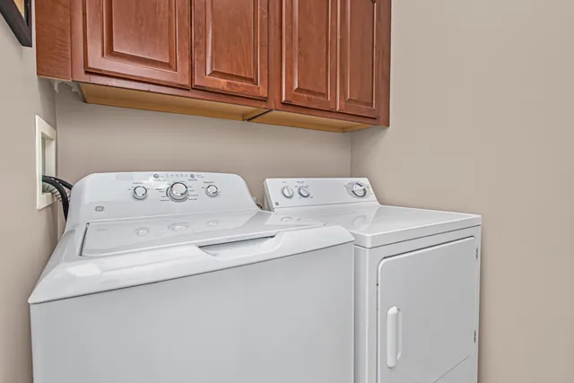 a balcony with wooden floor and fence