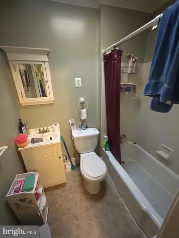 a kitchen with stainless steel appliances kitchen island granite countertop a sink and cabinets