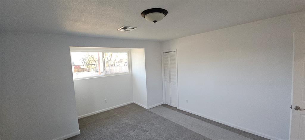2110 North 6th Street Waco, TX 76708 - Photo 12 of 23 an empty room with windows