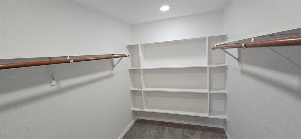 2110 North 6th Street Waco, TX 76708 - Photo 8 of 23 a view of an empty walk in closet